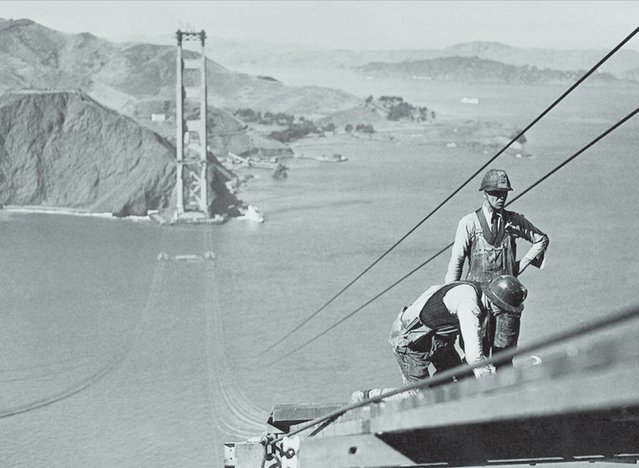 Black and White pic of Men working on GGBridge